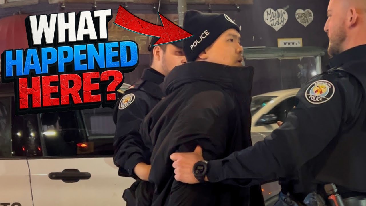 Man wearing Toronto police hat gets handcuffed