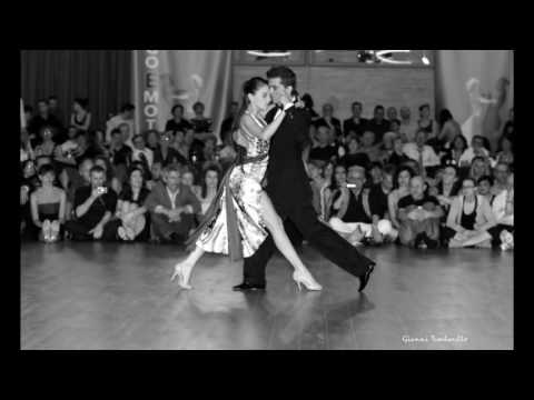  Mara Oviedo  and  Luciano Paulino  are  dancing  to  Ricardo Tanturi  at  Festival Tango Emotion 9  in  2016