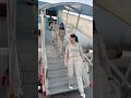 A graceful moment as the Super Air Jet flight attendant steps off the aircraft