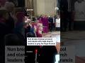 Nun breaks Vatican protocol and stands with male church leaders to pray for Pope Francis