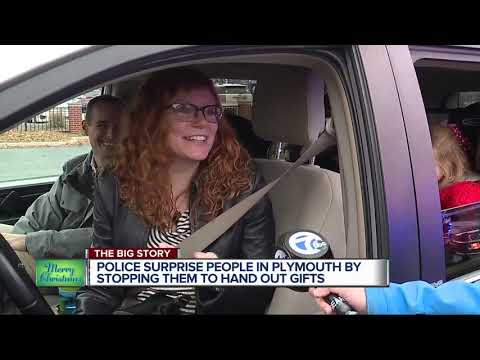 Police surprise people in Plymouth by stopping them to hand out gifts
