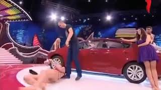 Man knocks woman to the ground after she hit him with her shoe on Russian game show