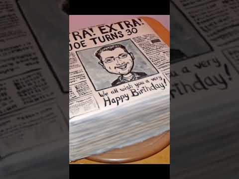 Informative good looking newspaper cake