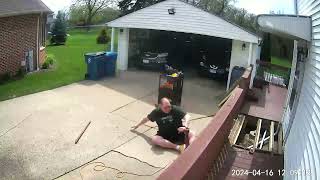 Man Loses Balance and Falls Backwards While Working on Deck - 1497834