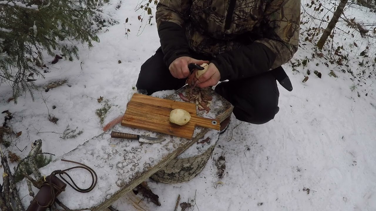 Cooking Stew Over an Outdoor Fire