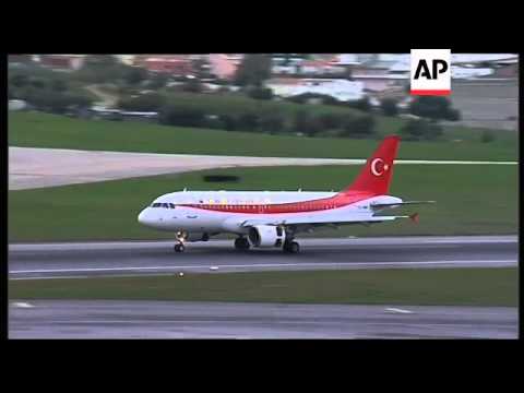 Leaders arrive for NATO summit; Obama sbites; Sarkozy