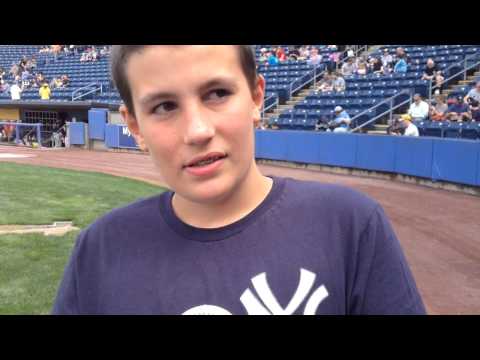 Cancer survivor Ian Torello, 12, throws out a first pitch In St. George