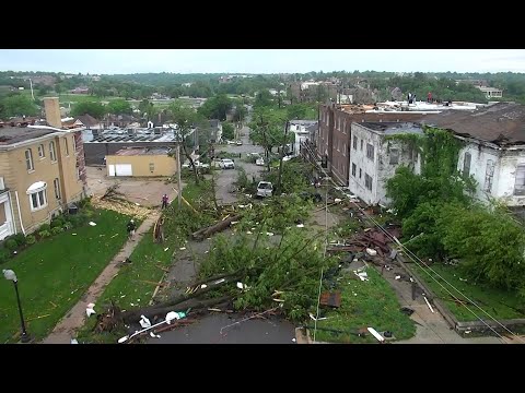 Crews are working to clear debris and restore power to neighborhoods in Jefferson City, Missouri, damaged by a devastating tornado (May 24)