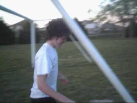 Climbing a Soccer goal with 1 hand