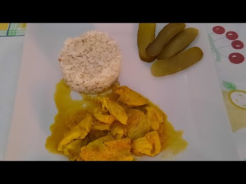 pavo al curri y cúrcuma con arroz.