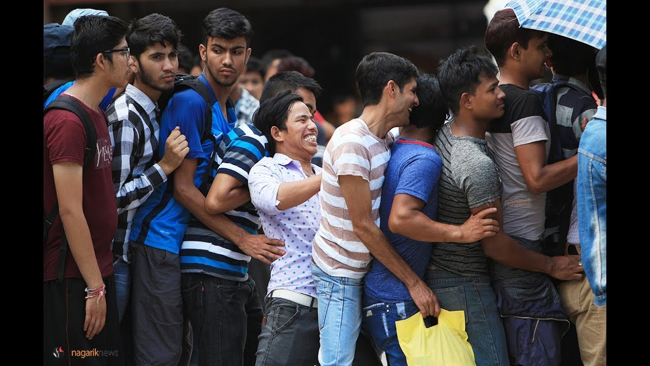 Passengers struggle to get tickets to go home during Dashain festival (photos/video)