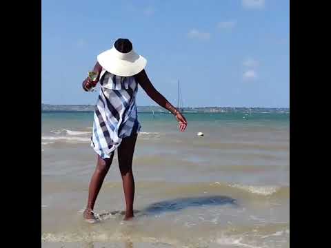 Akothee enjoying beach fan#Akothee