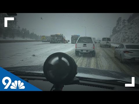 RAW: Roads being plowed and traffic build-up on I-70