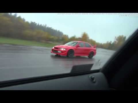 Tuned Mitsubishi Evo VI E85-powered vs BMW M6 Coupe stock in the rain from a roll and standstill