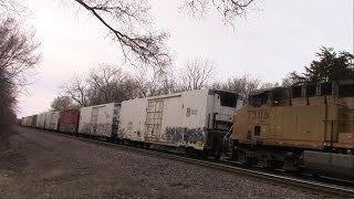 preview picture of video 'Union Pacific mixed freight crosses 2nd Street in Nevada, Iowa'