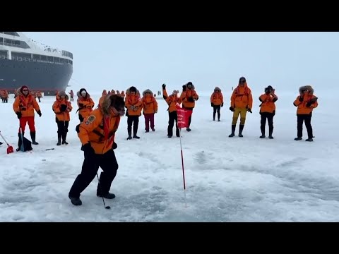 North pole golfers swap fairways for ice