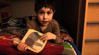 Logan reads a bedtime story.