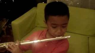 Matthew(age 7)playing flute