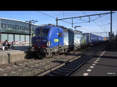BLS Vectron 193496 +P&O shuttle door station Tilburg en toetert naar spotters aan de overkant!