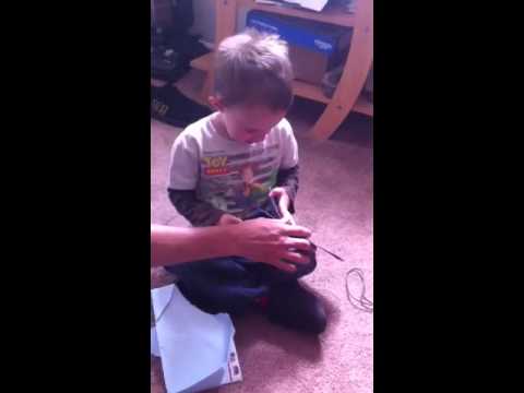 Ty opening his birthday card