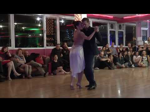  Lucas Molina  and  Judit Somos  are  dancing  to  the  tango  "  Como Se Muere De Amor  "  by  Alfredo De Angelis