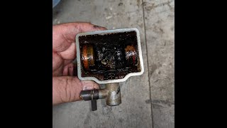 How to rebuild carburetor on vintage Honda C-70 motorcycle.