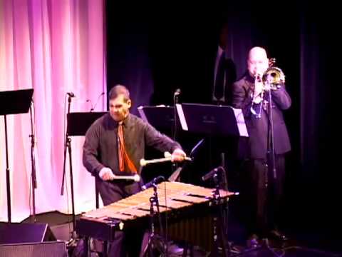 Steve Pouchie with Chembo Corniel playing Obsecion at Hostos College 2010