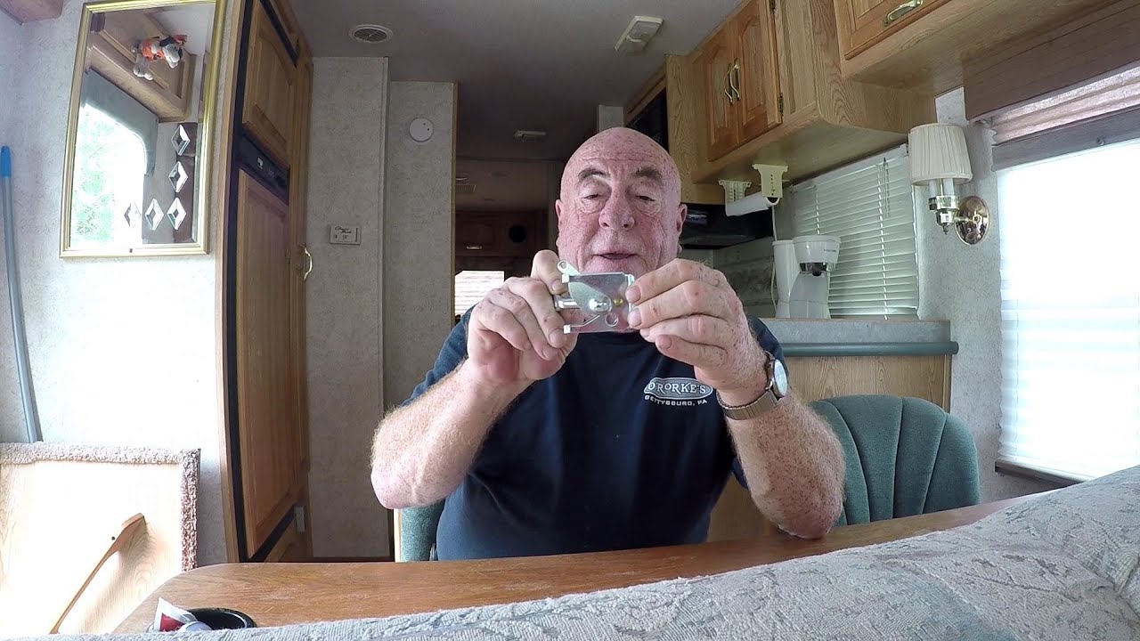 Self Latching Trap Door Latch