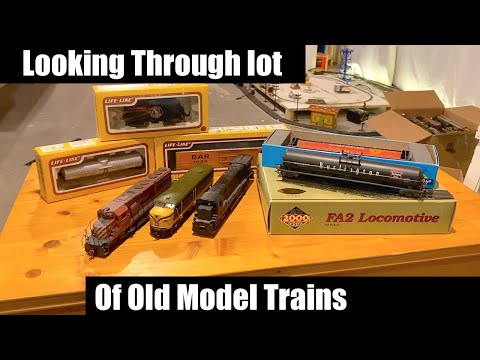 Looking Through Lot Of Old Model Trains