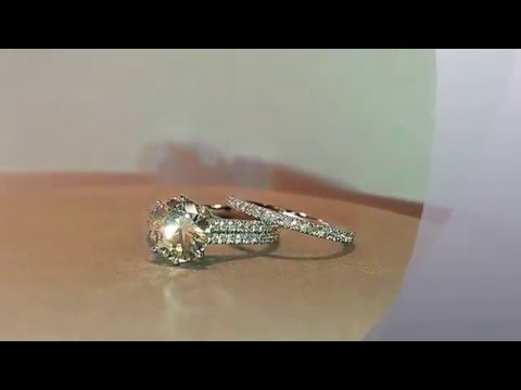 Custom double row diamond engagement ring with single row matching band.