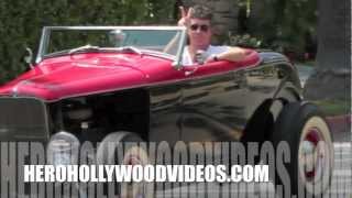 SIMON COWELL driving his classic on sunset blvd. "GO PRO PAPARAZZI"