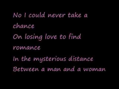 U2-A Man and a Woman (Lyrics)
