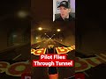 Pilot Flies Thru Tunnel