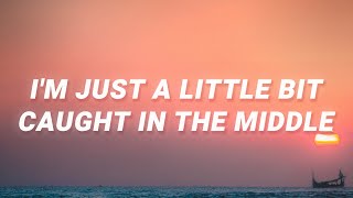 Lenka - I&#39;m just a little bit caught in the middle (The Show) (Lyrics)