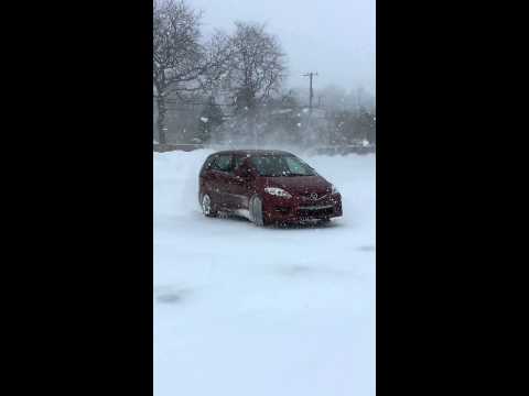 Drifting & sliding in the fresh snow fun in a Mazda 5