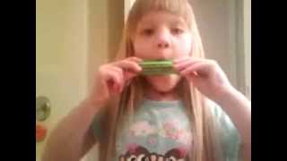 Lily Fletcher - playing harmonica at age 4 with original song