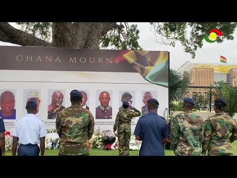 Colleagues of the Flying Officer & military team lay wreaths at floral tribute site in their honour