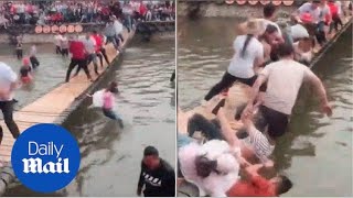 Hilarious game has people trying to shake opponents off a bridge