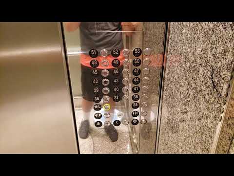 Double Decker Otis Elevonic 411M Traction High Rise Elevators at Republic Plaza in Denver, CO