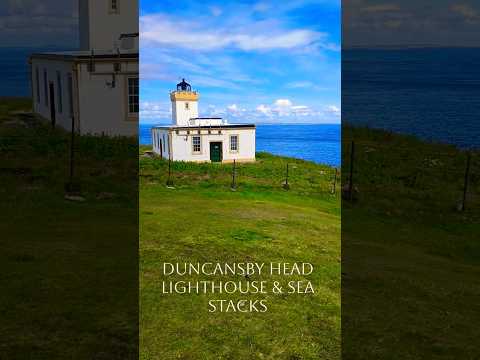 Duncansby Head Lighthouse and Sea Stacks the most Northerly Point of mainland Britian .