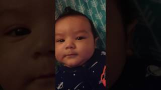 Mom sings "Moon River" to baby