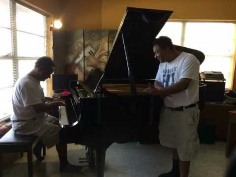 Kris Nicholson and his Clone at the piano