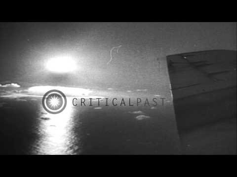 Explosion and smoke rise over Christmas Islands during first atomic bomb testing ...HD Stock Footage
