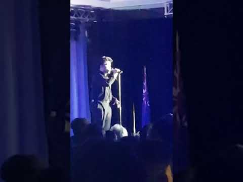 Teodoro singing "All this time" during Miss Cayman 2018