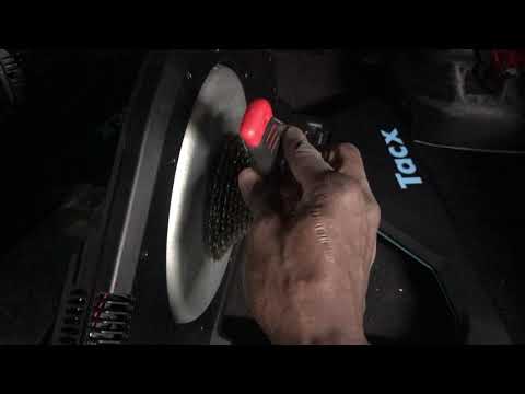 Removing a cassette from a Tacx Neo 2T Trainer.