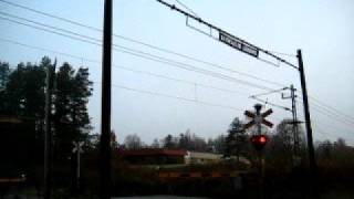 preview picture of video '[SJ] KtK (Kust-till-Kust) train crossing Bomvägen level crossing...'