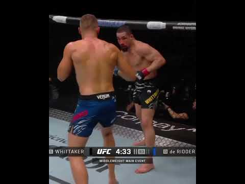 Robert Whittaker knocks down Reinier de Ridder
