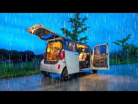 Camping in a small camper van in the heavy rain that keeps falling