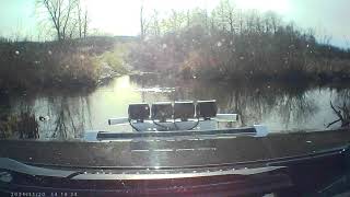 hummer h2 coming back from the woods and crossing the river to get to the house