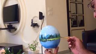 preview picture of video 'Landscape painting on ostrich egg by the painter Bilal Arkadan'
